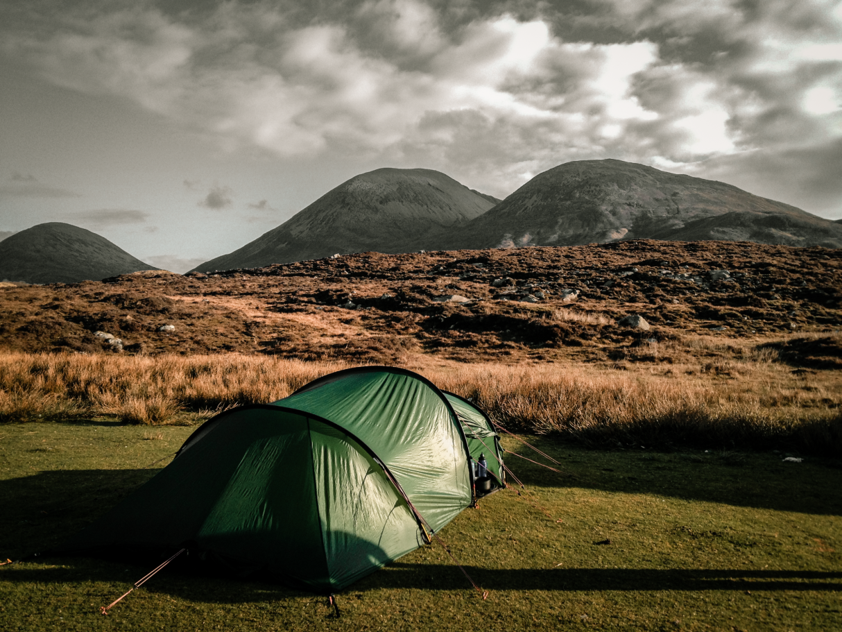 Tent campsite with the Cuillin Mountains on the Isle of Skye, Scotland.