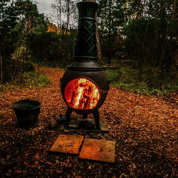 Stove Wood-burning outdoor stove at a campsite in the Scottish Highlands.